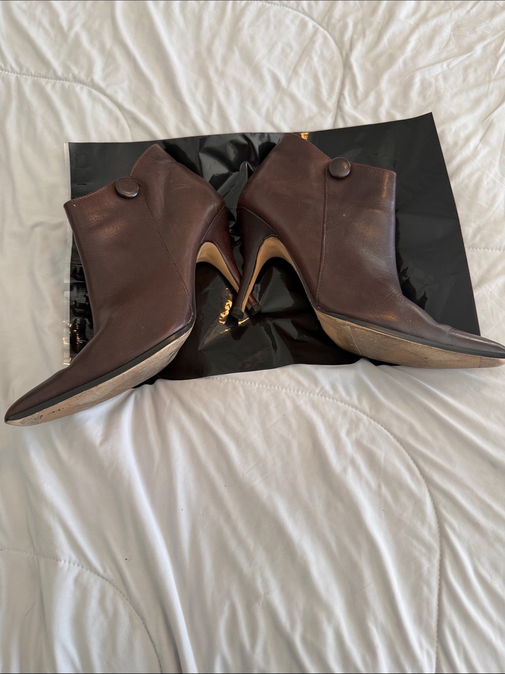 Pointed-Toe Dark Brown Leather Ankle Booties with Button Detail